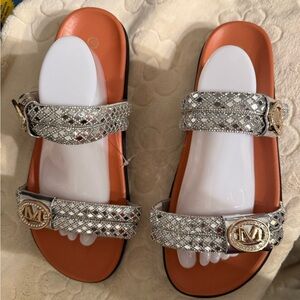 Chic Silver Slide Sandals with Monogram Buckle